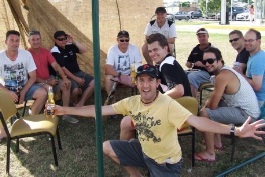 Sheltering in the hessian grandstand: L-R: Jim McKenzie, Dave Hutchison, Mark Gauci, Darren Nagle, Jim Polonidis (front), Jesse Nankivell-Sandor, Peter O'Kane (back), Sean O'Kane, Murray Walker, George Loh and Mick Cumbo. Sheltering in the hessian grandstand: L-R: Jim McKenzie, Dave Hutchison, Mark Gauci, Darren Nagle, Jim Polonidis (front), Jesse Nankivell-Sandor, Peter O'Kane (back), Sean O'Kane, Murray Walker, George Loh and Mick Cumbo.