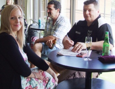 Checking out the form: Vanessa Schuller and partner Mark Gauci, with Tony Gleeson behind. Checking out the form: Vanessa Schuller and partner Mark Gauci, with Tony Gleeson behind.