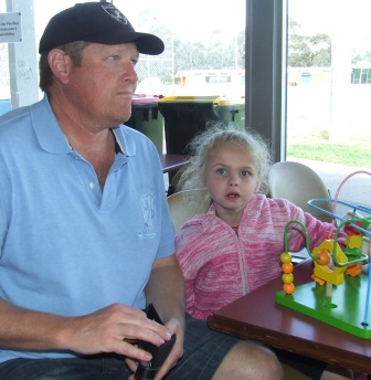 Fun and games for past President Darren Nagle and daughter Meg. Fun and games for past President Darren Nagle and daughter Meg.