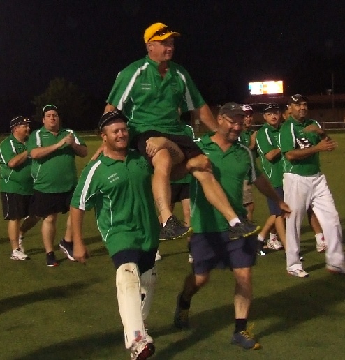 Sean O'Kane is chaired off at Barooga by his brothers Peter (left) and Mark. Sean O'Kane is chaired off at Barooga by his brothers Peter (left) and Mark.