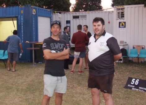 Outdoors - with the Blue Bar in the background. Ben Thomas (left) talks tactics with Shane Chalmers. Outdoors - with the Blue Bar in the background. Ben Thomas (left) talks tactics with Shane Chalmers.
