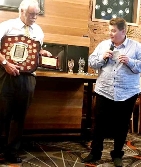 Mark Gauci responds to the announcement of his Lindsay Jones Award, while President Charlie Walker holds his plaque and the perpetual trophy. Mark Gauci responds to the announcement of his Lindsay Jones Award, while President Charlie Walker holds his plaque and the perpetual trophy.