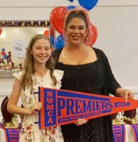 With the flag at the NWMCA presentation night on April 9: Katherine Baker (left) and Tanya Intagliata.