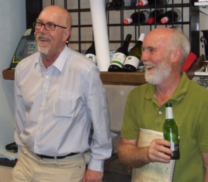 Enjoying themselves behind the bar: Committee members Kevin Gardiner (left) and Allan Cumming. Enjoying themselves behind the bar: Committee members Kevin Gardiner (left) and Allan Cumming.