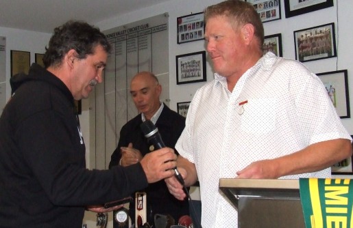 Tony Gleeson is handed the microphone by Darren Nagle after being inducted as a Life Member, with John Talone behind. Tony Gleeson is handed the microphone by Darren Nagle after being inducted as a Life Member, with John Talone behind.