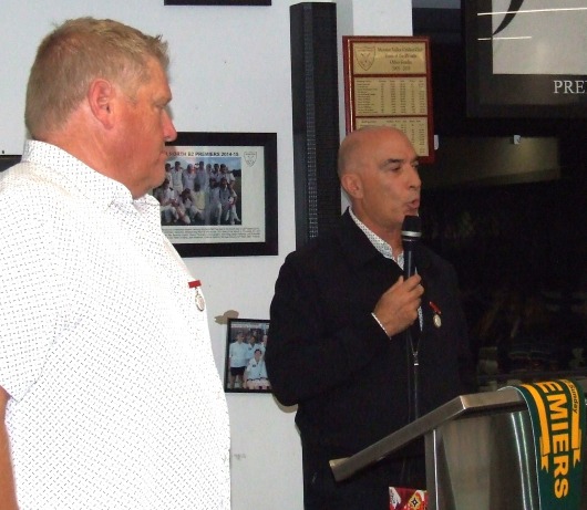 Darren Nagle listens as Life Member John Talone reads his citation for the Lindsay Jones Best Clubman award. Darren Nagle listens as Life Member John Talone reads his citation for the Lindsay Jones Best Clubman award.