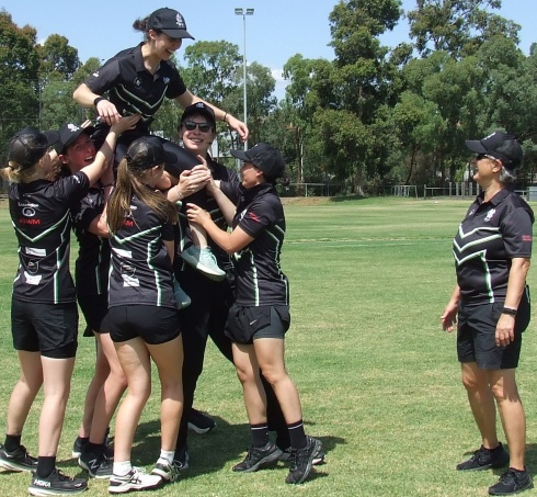 Up there Cazaly! Sarah Fenn is hoisted to the shoulders of her teammates while Sandra Verschoor watches on. Up there Cazaly! Sarah Fenn is hoisted to the shoulders of her teammates while Sandra Verschoor watches on.