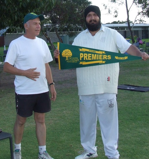 Captain Manu Singh (far right) receives the Premiership pennant from Mercantile Secretary Rhidian Thomas. Captain Manu Singh (far right) receives the Premiership pennant from Mercantile Secretary Rhidian Thomas.