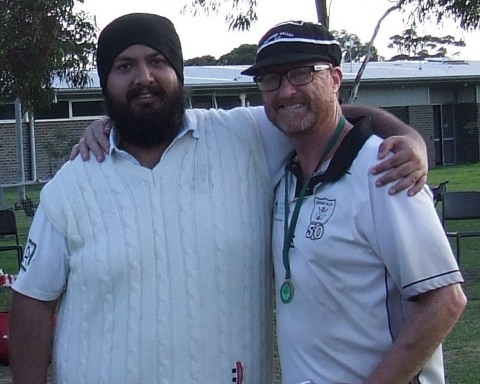 Dean Lawson (far right) after being presented his Premiership medallion by Manu Singh. Dean Lawson (far right) after being presented his Premiership medallion by Manu Singh.