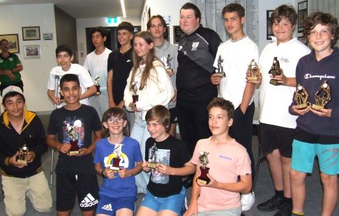 Our Under 14s: L-R: Back - Marcus Woolley, Dante Mazarella, Addison Lambertini, captain Katherine Baker, assistant coach Joshua Norsetter, coach Andreas Skiotis, Christian Marchionno, David Lubansky and Jeremy Sevenson. Front - Rayan Noor Raziq, Orlando Vandrine, Lachlan McDermott, Luke Sevenson and Liam Richardson.