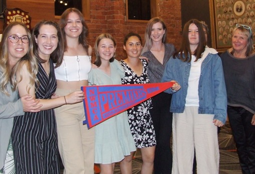 Members of our women's team and their premiership flag: L-R Sarah Gooden, Sarah Fenn, Tara Newman, Katherine Baker, Yasmin King, Kelsie Armstrong, Audrey Brown and Adele Walker. Members of our women's team and their premiership flag: L-R Sarah Gooden, Sarah Fenn, Tara Newman, Katherine Baker, Yasmin King, Kelsie Armstrong, Audrey Brown and Adele Walker.