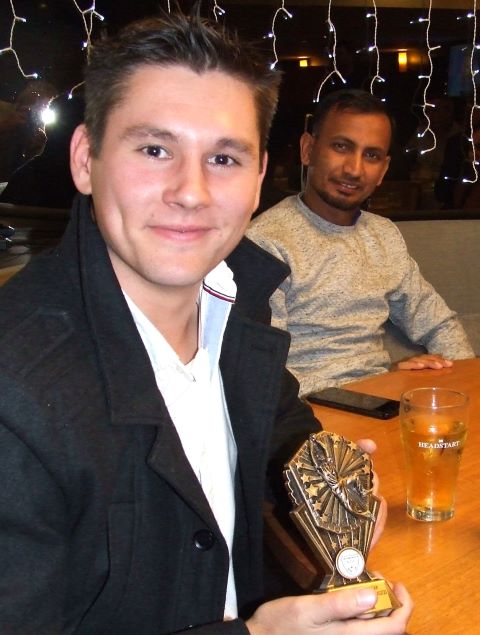 First Eleven captain Jack Newman with his fielding award - and teammate Salman Afridi in the background. First Eleven captain Jack Newman with his fielding award - and teammate Salman Afridi in the background.