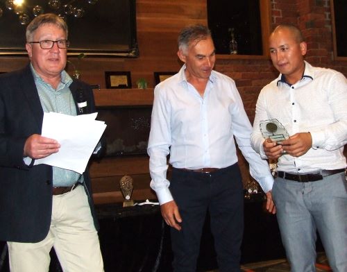 Chand Shrestha (right) is awarded the Sean O'Kane Trophy by Peter Golding (left) and Dean Jukic. Chand Shrestha (right) is awarded the Sean O'Kane Trophy by Peter Golding (left) and Dean Jukic.