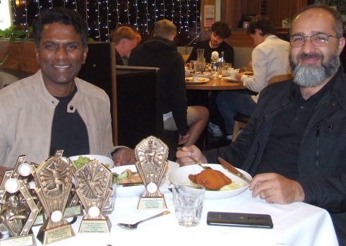 A table of trophies - Fourths captain Prem Janarthanan (left) and batting award winner Adeel Babur. A table of trophies - Fourths captain Prem Janarthanan (left) and batting award winner Adeel Babur.