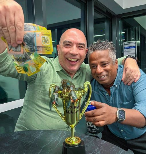John Talone (left) was the owner of the winning yabby. Serial pest Sai Vivekananthan helps him celebrate. John Talone (left) was the owner of the winning yabby. Serial pest Sai Vivekananthan helps him celebrate.