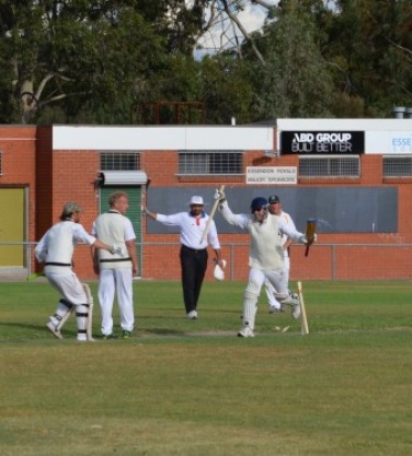 We did it! Jesse Felle (left) runs towards Pat Taylor as the winning four scorches over the boundary line, while umpire Farhan Khan signals match over. We did it! Jesse Felle (left) runs towards Pat Taylor as the winning four scorches over the boundary line, while umpire Farhan Khan signals match over.