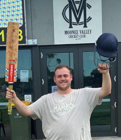 Lachlan Smith raises his bat for his maiden century. Lachlan Smith raises his bat for his maiden century.